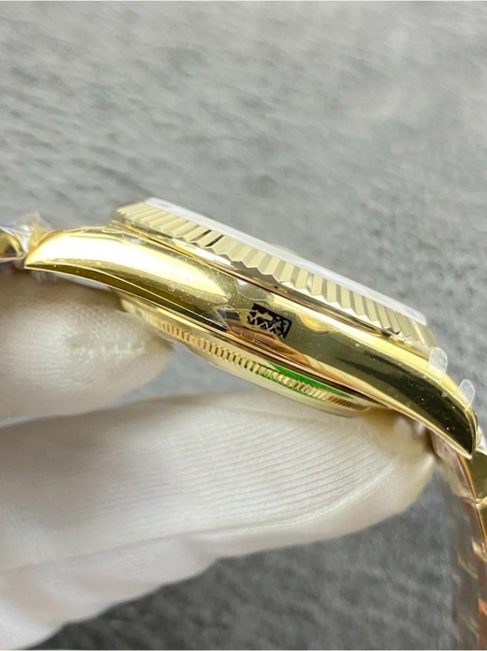 Rolex Day-Date 40 Green Roman Yellow Gold
